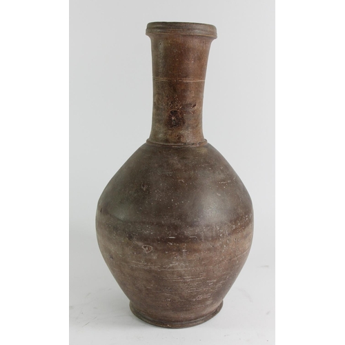 128 - A hand thrown terracotta baluster flask, 37cm