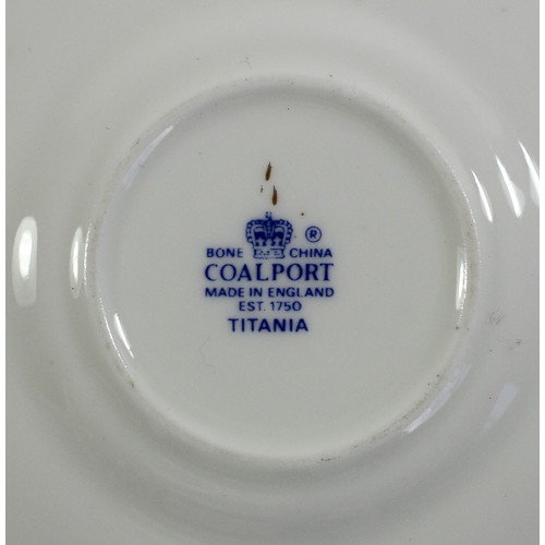 133 - A Coalport Titania miniature tea service, comprising tea pot, sugar bowl, milk jug, cup, saucer and ... 