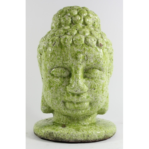 135 - A large hand potted terracotta bust of Buddha, lime green mottled glaze, 34cm