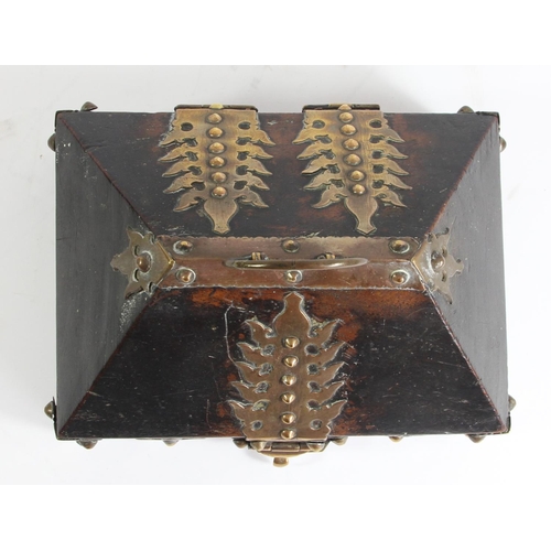 136 - A Indian Kerala Netturpetti jewellery casket, the hardwood body with brass mounts, 21 x 16 x 13cm