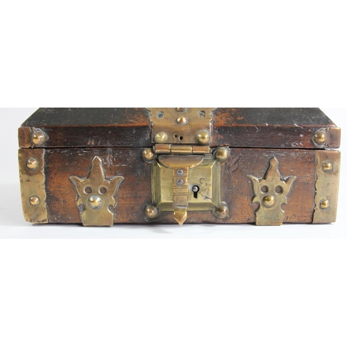 136 - A Indian Kerala Netturpetti jewellery casket, the hardwood body with brass mounts, 21 x 16 x 13cm