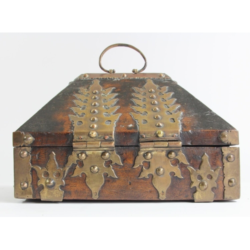 136 - A Indian Kerala Netturpetti jewellery casket, the hardwood body with brass mounts, 21 x 16 x 13cm