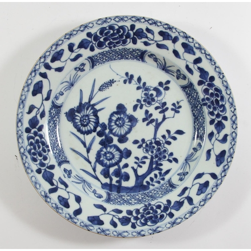 139 - An 18th century Chinese blue and white plate with pagoda decoration, 23cm, another with a rocky land... 