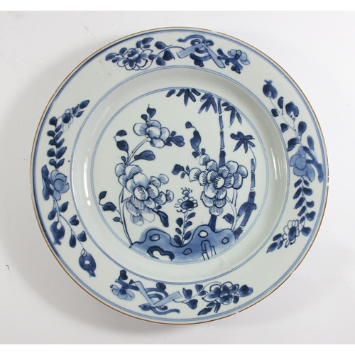 139 - An 18th century Chinese blue and white plate with pagoda decoration, 23cm, another with a rocky land... 