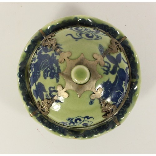 140 - A Chinese blue and green glaze lidded bowl, with boys and a kite pattern to the bowl, dragon to the ... 