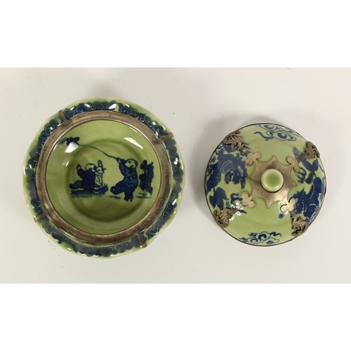 140 - A Chinese blue and green glaze lidded bowl, with boys and a kite pattern to the bowl, dragon to the ... 