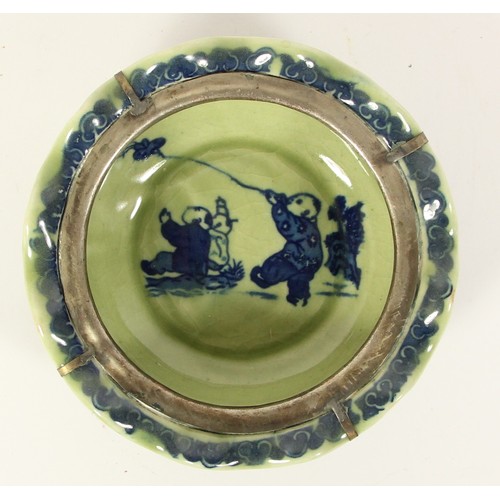 140 - A Chinese blue and green glaze lidded bowl, with boys and a kite pattern to the bowl, dragon to the ... 