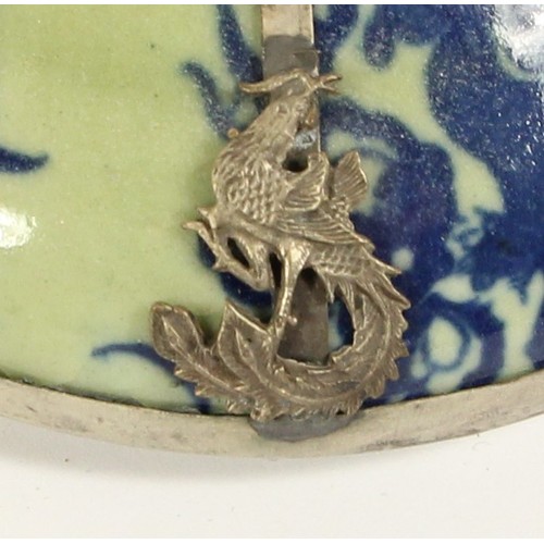 140 - A Chinese blue and green glaze lidded bowl, with boys and a kite pattern to the bowl, dragon to the ... 