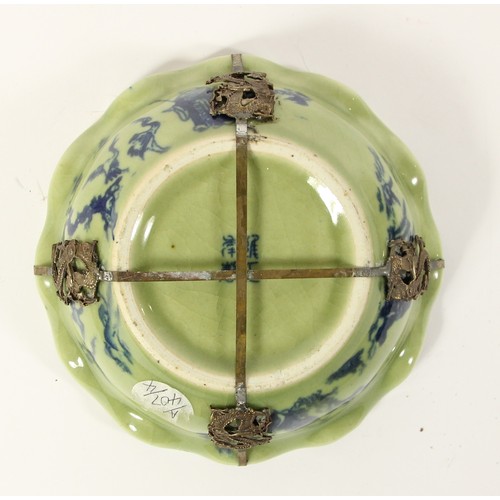 140 - A Chinese blue and green glaze lidded bowl, with boys and a kite pattern to the bowl, dragon to the ... 