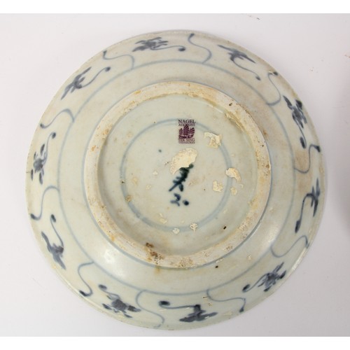 141 - Three Chinese Tek Sing plates, circa 1820s, decorated with blue and white lotus designs, retains Nag... 