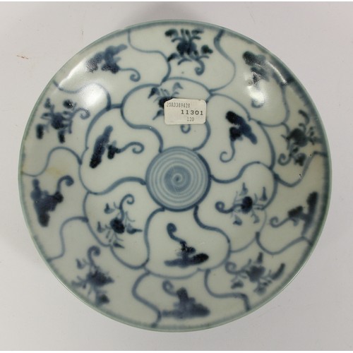 141 - Three Chinese Tek Sing plates, circa 1820s, decorated with blue and white lotus designs, retains Nag... 