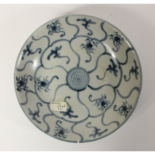 143 - Two Chinese Tek Sing plates, circa 1820s, decorated with blue and white lotus designs, character mar... 