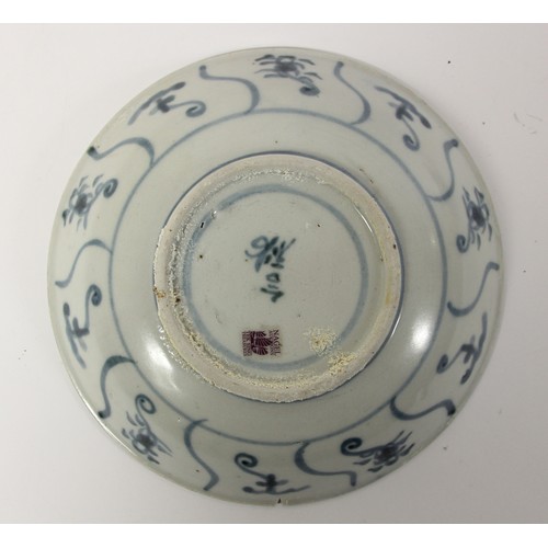 143 - Two Chinese Tek Sing plates, circa 1820s, decorated with blue and white lotus designs, character mar... 