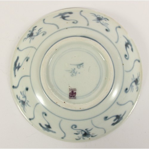 143 - Two Chinese Tek Sing plates, circa 1820s, decorated with blue and white lotus designs, character mar... 