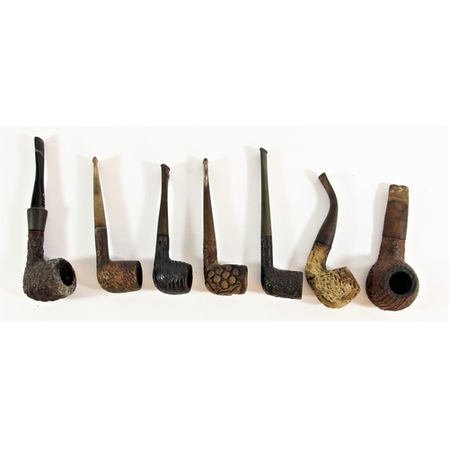 151 - Dunhill, a textured textured brier pipe, together with six other textured pipes, to include Reject, ... 