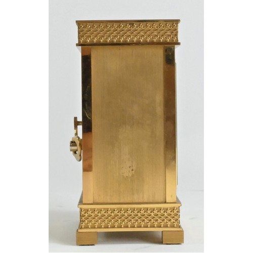 212 - Luxor, a gilt brass mantle clock, the fretwork dial with a silvered chapter ring, the 8 day Swiss mo... 