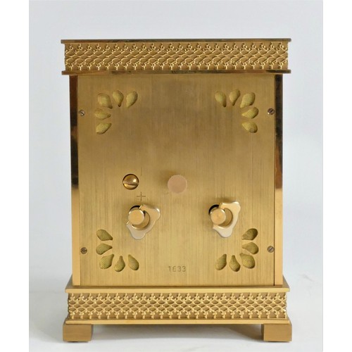 212 - Luxor, a gilt brass mantle clock, the fretwork dial with a silvered chapter ring, the 8 day Swiss mo... 