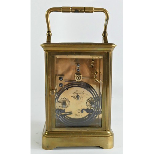 213 - Henri Jacot, Paris, a 19th century French brass carriage clock, white enamel dial, the signed moveme... 