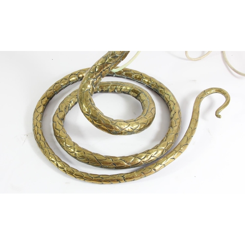 269 - An Austrian Art Nouveau bronze snake lamp, the realistically modelled coiled body holding a lamp in ... 