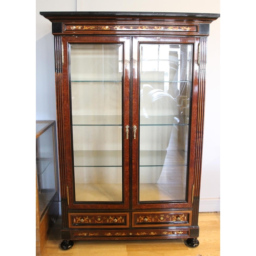 275 - A continental burr walnut and ebonised display cabinet, inlaid floral frieze and two lower drawers, ... 