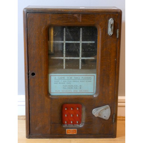 293 - A Noughts and Crosses penny arcade machine, supplied by Philip Shefracs Ltd, London, oak case with g... 