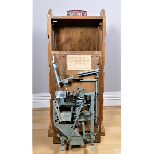 313 - Bryans Payramid oak skill travelling arcade ball catching game penny slot machine, designed c.1934, ... 