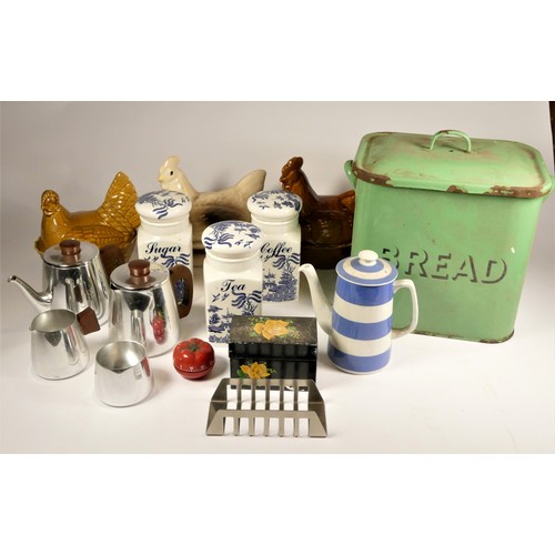 35 - A mid 20th Century white enamelware flour bin, together with a green enamel bread bin, various sized... 