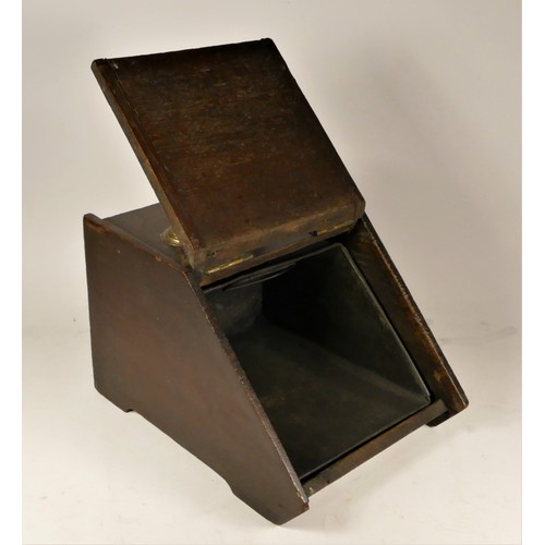 42 - A Victorian oak fireside coal scuttle/logbox, with decorative brass hinges  brass drop handle and me... 