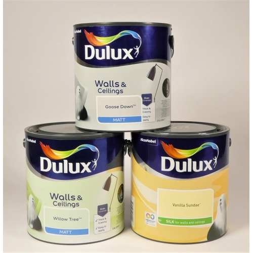 Approximately 75 tins of Dulux paint, mainly consisting of wall