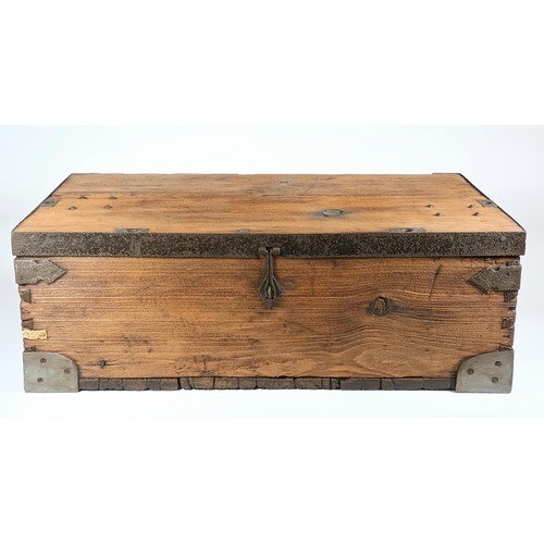 40 - A rustic pine plank traveling trunk, with hinged lid, steel bound corners and edging, cast drop hand... 