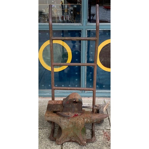 12 - A blacksmiths anvil, overall length 54cm, a No3 table top vice, unbranded, together with a metal sac... 