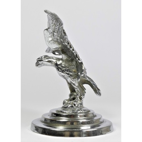 42 - A chrome car mascot in the form of an eagle mounted on a stepped base (one wing repaired) 14cm.