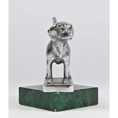 56 - A chrome car mascot in the form of a Beagle mounted on a green onyx base, 9cm.