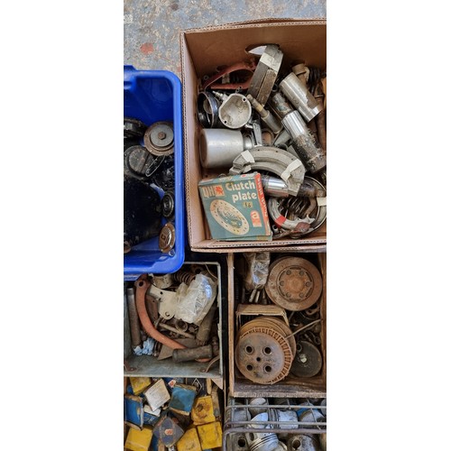 216 - A large collection of sundry motorcycles spares to include pistons, M20 oil tank, horns and bearings... 