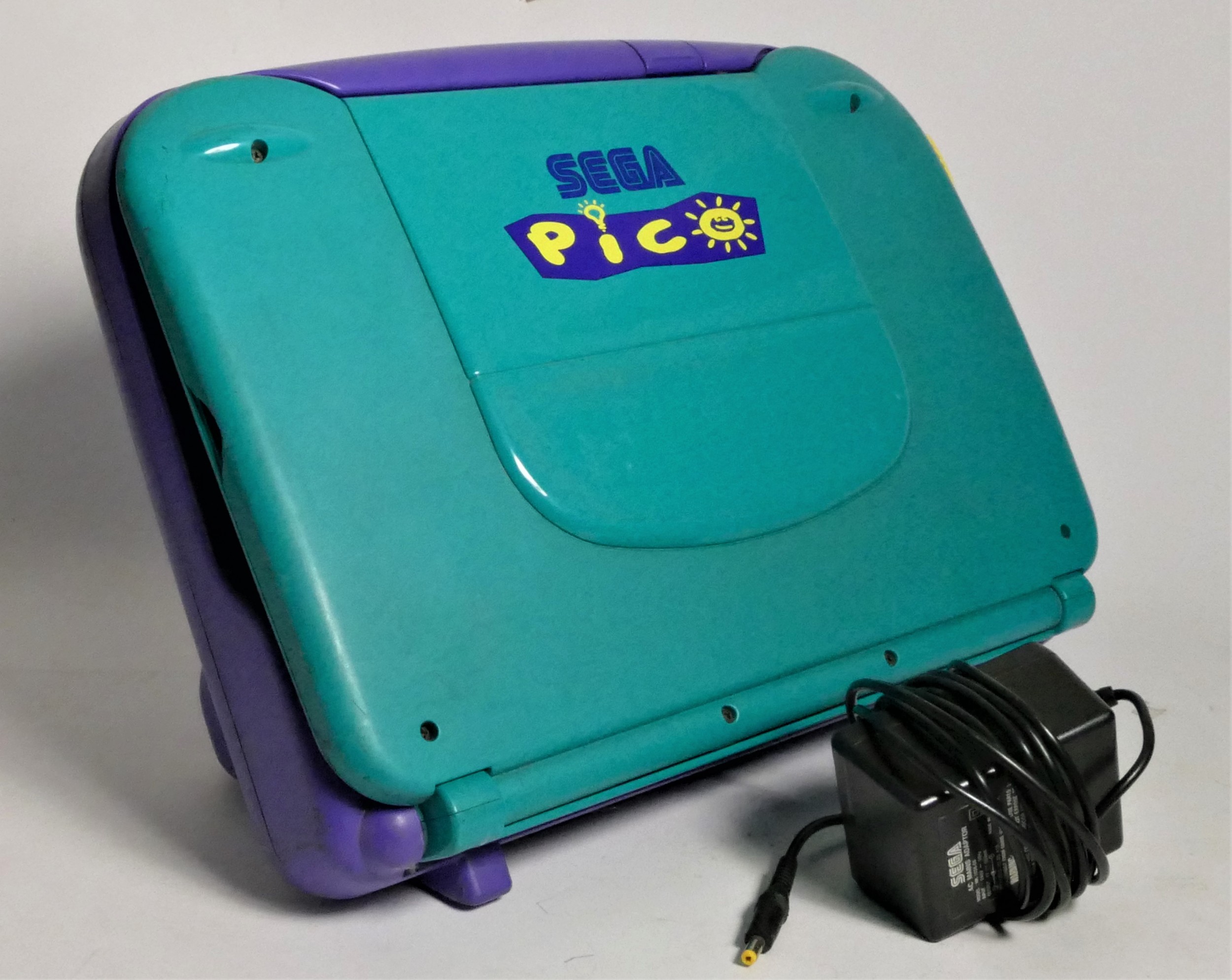 A Sega Pico video games console (450060493) with AC cable