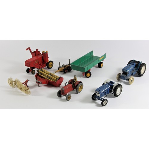 74 - A Corgi Major Toys Massey Ferguson 780 combine harvester, together with two Britain's Ford tractors,... 