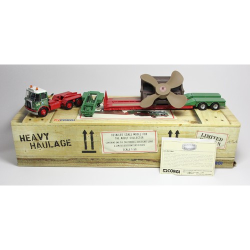 77 - A Corgi Atkinson Venturer 2 axle low loader and propeller load (CC12513), boxed, a Corgi Volvo F88 T... 