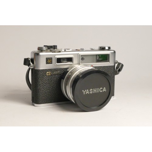 98 - A Yashica Electro GS 35 rangefinder 35mm film camera, cased, with a 45mm f1.7 lens, also including t... 