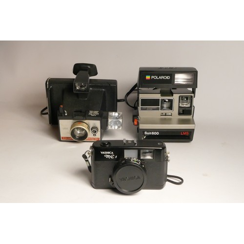 113 - A Yashica ME1 35mm film camera, with a 38mm f2.8 lens, a Polaroid Colorpack 80, manual, flash bulb a... 