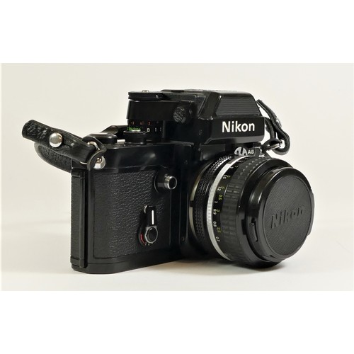 116 - A Nikon F2 (7760927) SLR camera, black, with Photomic AS viewfinder, cased, with a Nikon 50mm f1.4 l... 