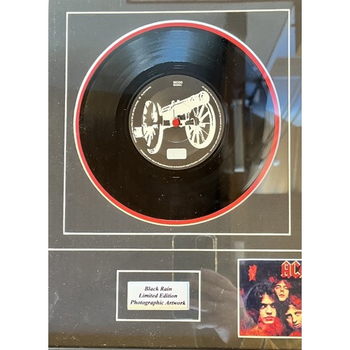 142 - A mounted vinyl single, AC/DC - Big Gun (Warner Music), with Black Rain limited edition photographic... 