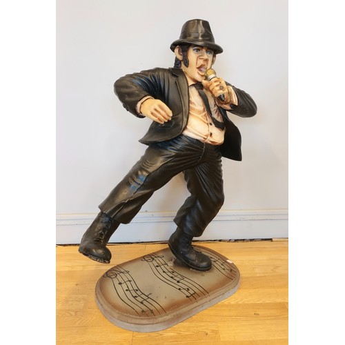 167 - A pair of resin figures, The Blues Brothers, hollow cold cast resin, wooden bases, decorated with mu... 