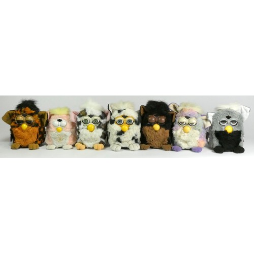 175 - Six Classic Furbies robotic toys, c.1998, all with material tag (two with card tag and purple plasti... 