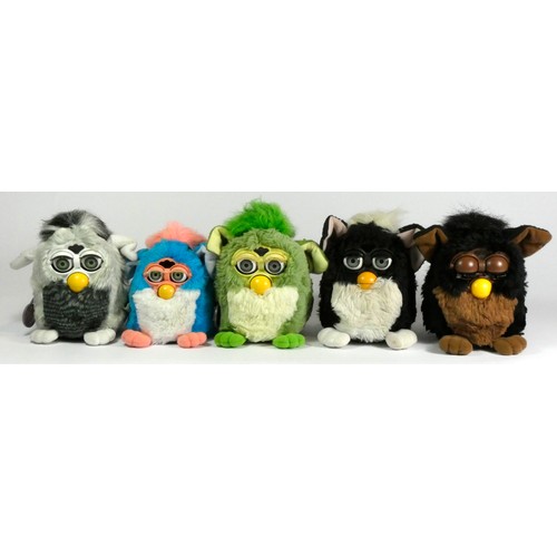 176 - Four Classic Furbies robotic toys, c.1998, all with material tag (two with purple plastic tag), toge... 