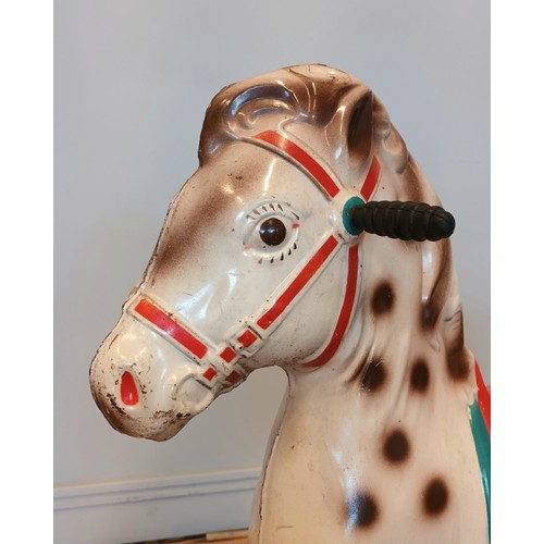 187 - A Mobo rocking horse, pressed metal, foot rests and rubber grips, 102cm x 84cm x 37cm

Known by prev... 