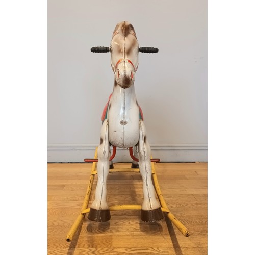 187 - A Mobo rocking horse, pressed metal, foot rests and rubber grips, 102cm x 84cm x 37cm

Known by prev... 