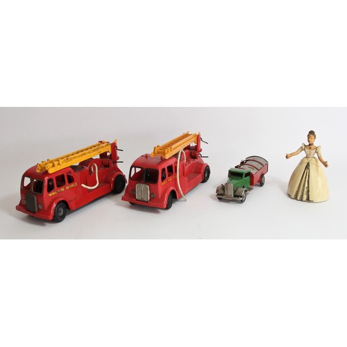 189 - Two Tri-ang Minic series 2 fire engines, friction drive, together with a Tri-ang Mimic covered flatb... 