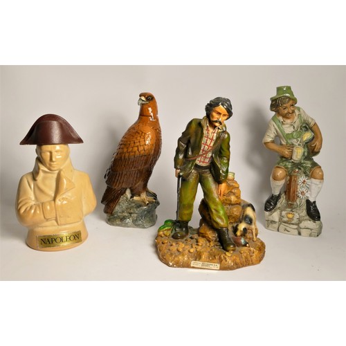 198 - Four character liquor bottles, including a Beswick Golden Eagle decanter, a Tolchenne S.A brandy bot... 