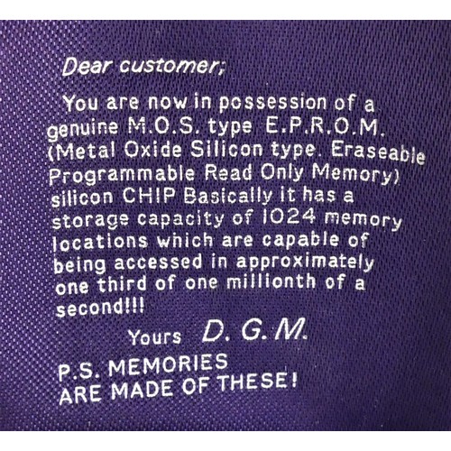 200 - A DGM The Mighty Chip gold pendant, contains a M.O.S. type silicon chip set in a gold pendant