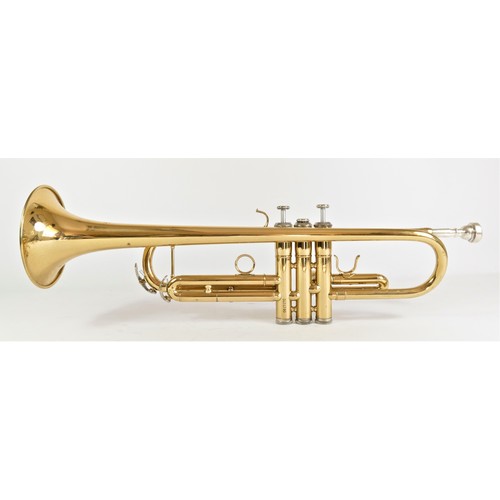 204 - A Jazzo trumpet with silver plated mouth piece, mother of pearl inlay buttons, white cotton gloves a... 